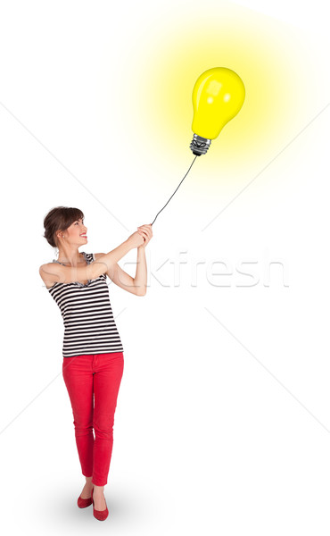 快樂 女子 燈泡 氣球 年輕女子 商業照片 © ra2studio
