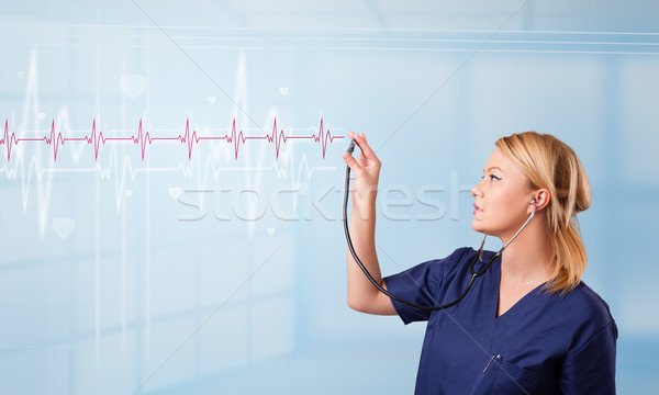 漂亮 醫生 聽 紅色 脈衝 心臟 商業照片 © ra2studio