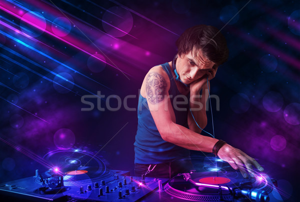 Fiatal játszik lemezjátszók szín fényeffektusok vonzó Stock fotó © ra2studio