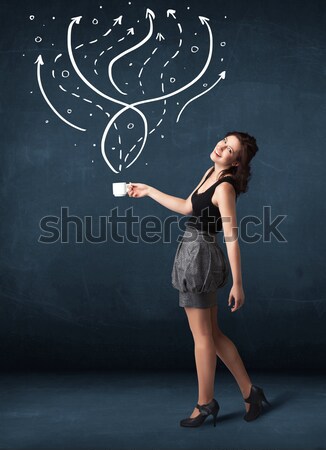 Businesswoman holding a white cup with lines and arrows Stock photo © ra2studio