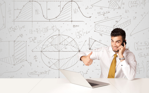 Stock photo: Businessman with business calculations background