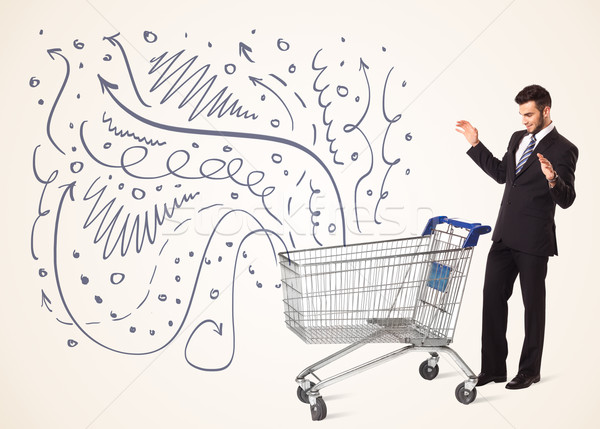 Stock photo: Businessman with shopping cart