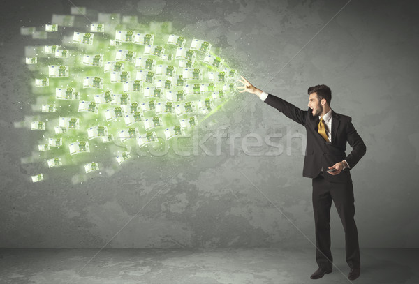 Young business person throwing money concept Stock photo © ra2studio