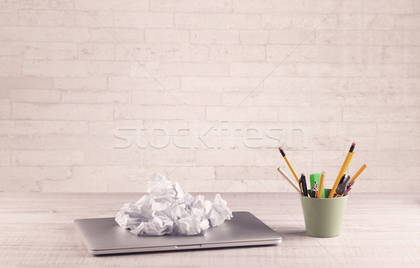 Office Desk Closeup With White Brick Wall Stock Photo C Rancz
