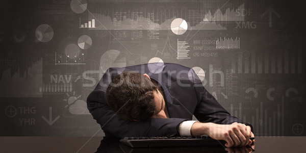 Businessman sleeping with charts, graphs and reports concept Stock photo © ra2studio