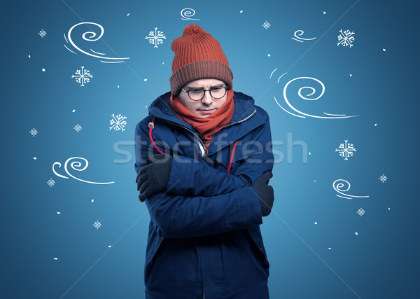 Frozen boy with doodled snowflake and windy concept Stock photo © ra2studio
