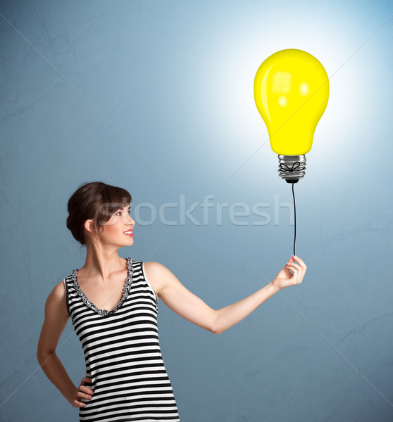 Joli dame ampoule ballon jeune femme [[stock_photo]] © ra2studio