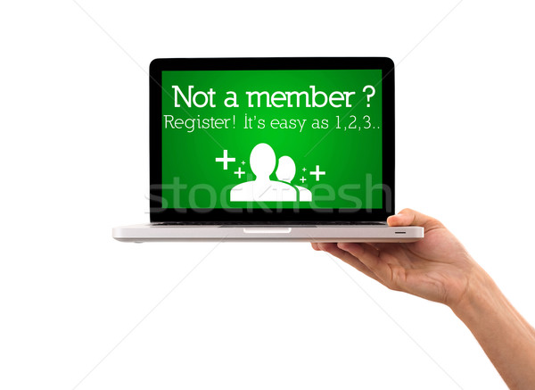 Hand holding laptop with register sign Stock photo © ra2studio