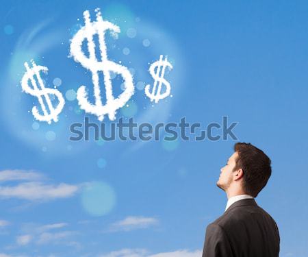Wskazując znak dolara chmury Błękitne niebo biznesmen działalności Zdjęcia stock © ra2studio