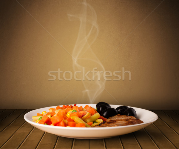 Fresh delicious home cooked food with steam Stock photo © ra2studio