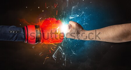 Worker with airbrush painting with glowing golden paint  Stock photo © ra2studio