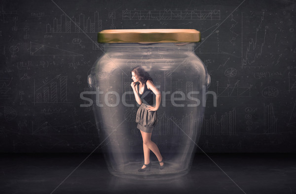 Businesswoman shut inside a glass jar concept Stock photo © ra2studio