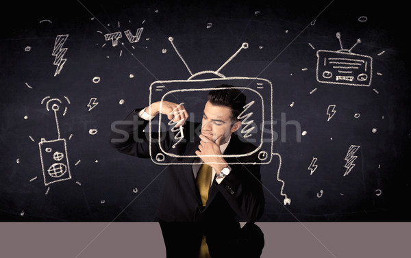 Happy businessman drawing tv and radio Stock photo © ra2studio
