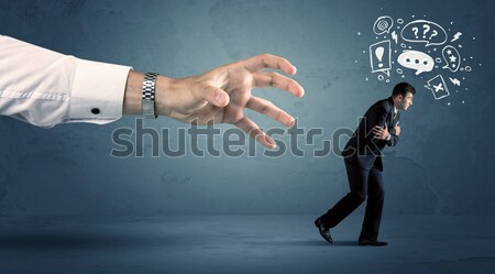 Business man running from a big hand  Stock photo © ra2studio