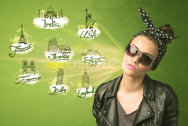 Happy young girl with sunglasses traveling to cities around the  Stock photo © ra2studio