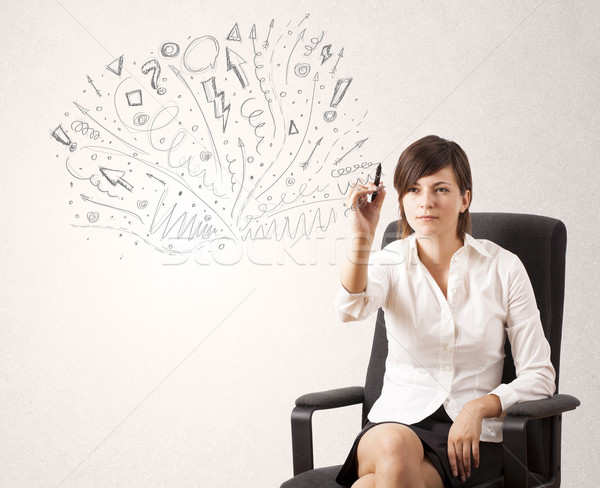 Stock photo: Young girl drawing and skteching abstract lines 