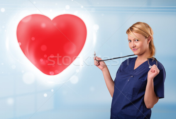 Zdjęcia stock: Młodych · pielęgniarki · uzdrowienie · czerwony · serca · dość