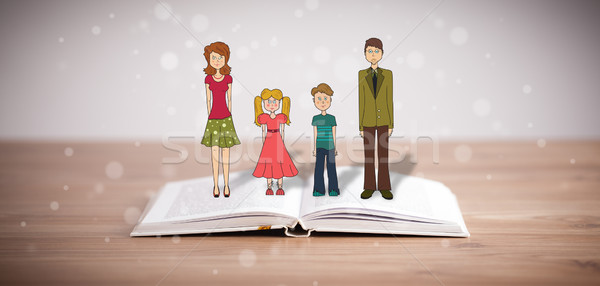 Drawing of a happy family on opened book Stock photo © ra2studio