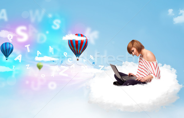 Young woman sitting in cloud with laptop Stock photo © ra2studio