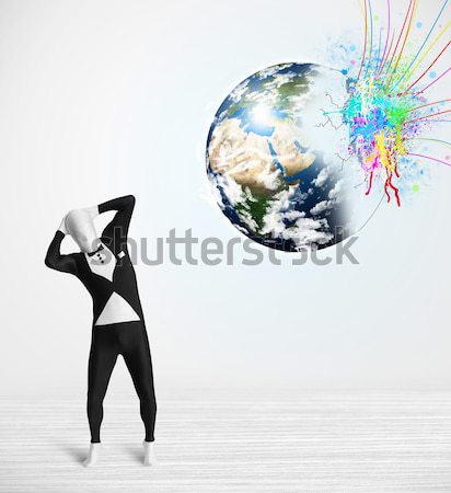Businesswoman on rock mountain with a globe Stock photo © ra2studio