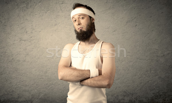Young male showing muscles Stock photo © ra2studio