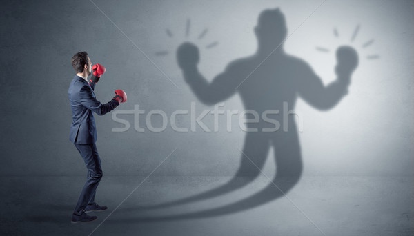 üzletember harcol árnyék verekedés férfi sport Stock fotó © ra2studio