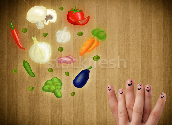 Happy smiley face fingers cheerfully looking at illustration of colorful healthy vegetables Stock photo © ra2studio