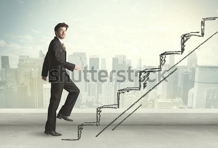 Businessman standing on the edge of rooftop Stock photo © ra2studio