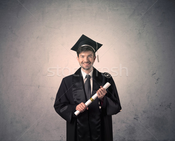 Portret jonge afgestudeerde student gelukkig Stockfoto © ra2studio