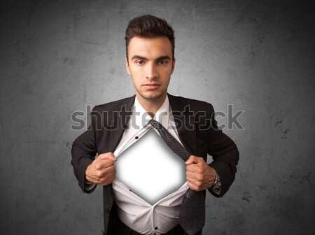 Businessman tearing off his shirt with white copyspace on chest Stock photo © ra2studio