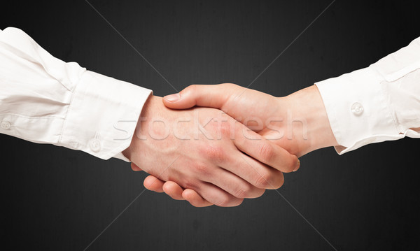 Działalności handshake czarny strony człowiek pracy Zdjęcia stock © ra2studio