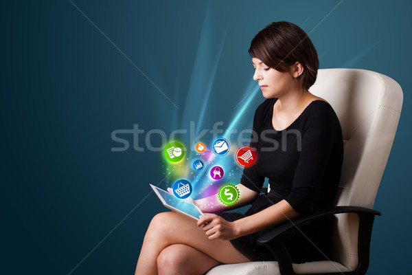 Fiatal üzletasszony néz modern tabletta absztrakt Stock fotó © ra2studio