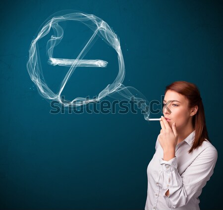 Stock photo: Young lady smoking unhealthy cigarette with no smoking sign