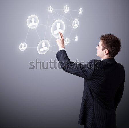 Group of happy smiley faces coming out of gun shaped hands Stock photo © ra2studio