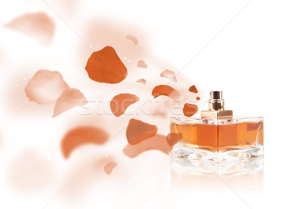erfume bottle spraying rose petals Stock photo © ra2studio