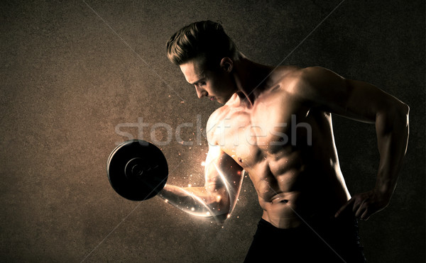 Bodybuilder Heben Gewicht energetische weiß Zeilen Stock foto © ra2studio