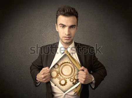 Businessman tearing shirt off and machine cog wheel shows Stock photo © ra2studio