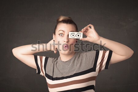 Jeunes stupide fille regarder dessinés à la main oeil Photo stock © ra2studio