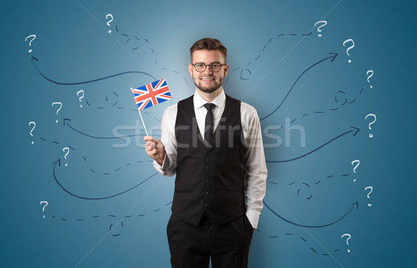 Man standing with flag and destination concept Stock photo © ra2studio