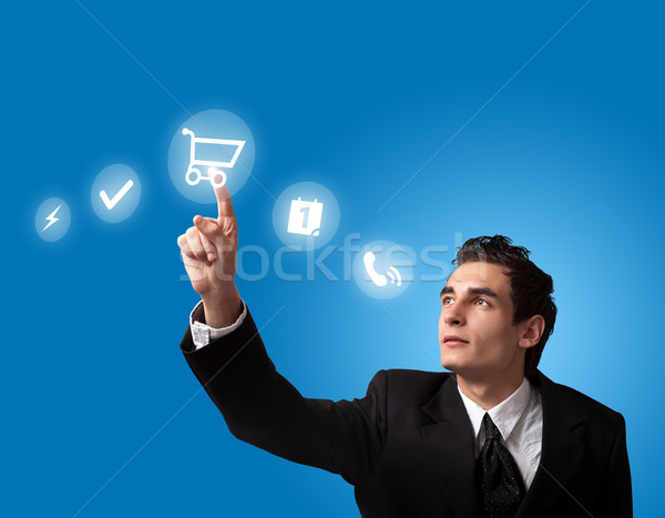  man pressing a touchscreen button Stock photo © ra2studio