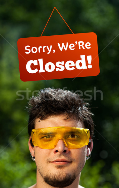 Young persons head looking at closed and open signs Stock photo © ra2studio