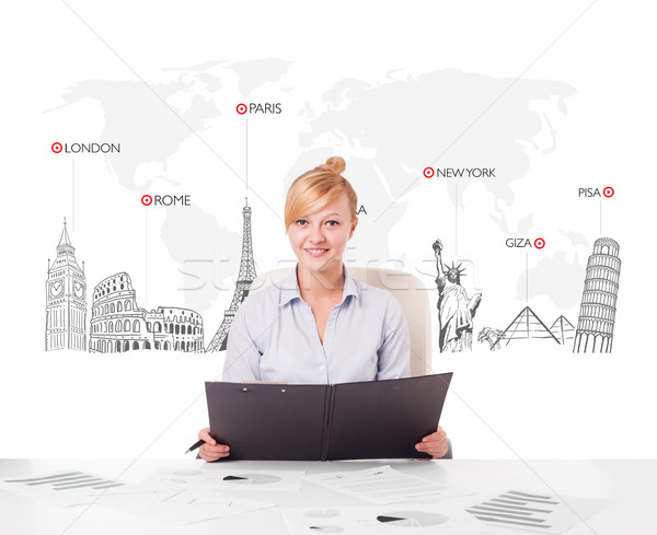 Beautiful young businesswoman with world map and major landmarks of the world Stock photo © ra2studio