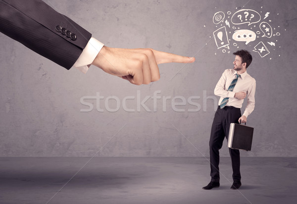 Stock photo: Boss hand pointing at confused employee