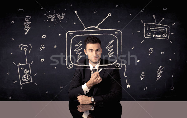 Happy businessman drawing tv and radio Stock photo © ra2studio