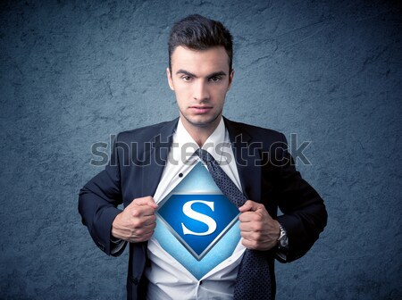 Businessman ripping off his shirt with superhero sign  Stock photo © ra2studio