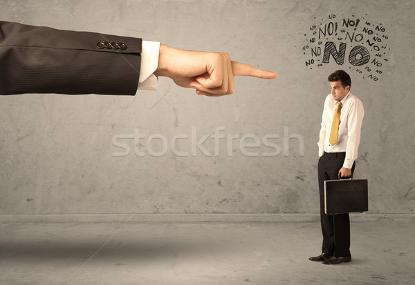 Boss hand guiding beginner salesman Stock photo © ra2studio