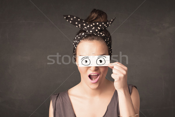 Funny woman looking with hand drawn paper eyes Stock photo © ra2studio
