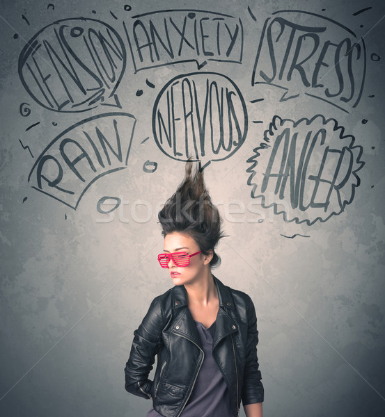 Mad young woman with extreme haisrtyle and speech bubbles Stock photo © ra2studio