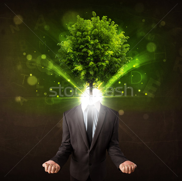 Man with green tree head concept Stock photo © ra2studio