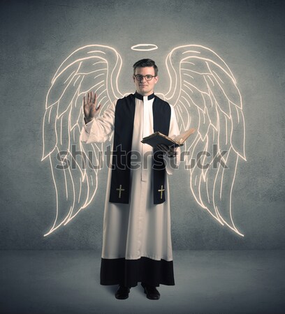 Młodych kapłan błogosławieństwo mężczyzna Zdjęcia stock © ra2studio